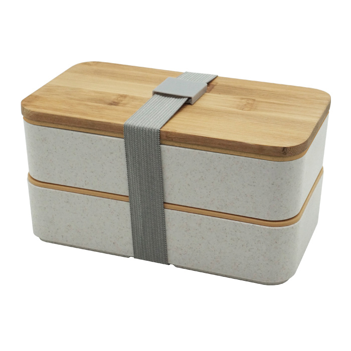 A2863, Box lunch doble de fibra de trigo con tapa de bambú que incluye: tapa divisora con 3 cubiertos ( cuchara, tenedor y cuchillo), y resorte de seguridad para fácil cierre.